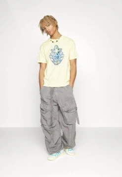 Fila TWISTETAL GRAPHIC TEE - T-Shirt Print - Pale Banana -Fila Verkaufe 0ceba70411c44d40935a465e81af95a4