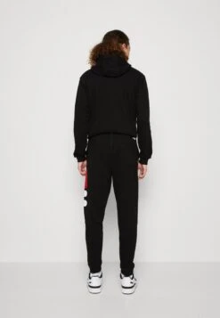 Fila BRONTE PANTS UNISEX - Jogginghose - Black -Fila Verkaufe 57d60ca998784d8ab7819af398e751bf