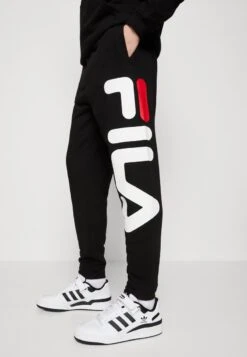 Fila BRONTE PANTS UNISEX - Jogginghose - Black -Fila Verkaufe b8d38865c8604d6c8b80ff8c23581cab